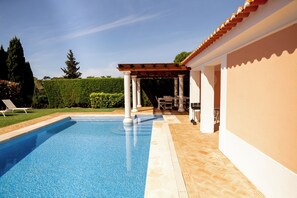 The Swimming Pool - Long chairs, hammocks, green grass and plenty of space.