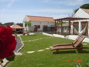 La suite Étables et la maison d'été.