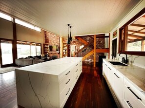 Open plan kitchen, lounge and dining.